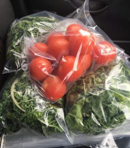 Photo of sample tomatoes and spinach bagged